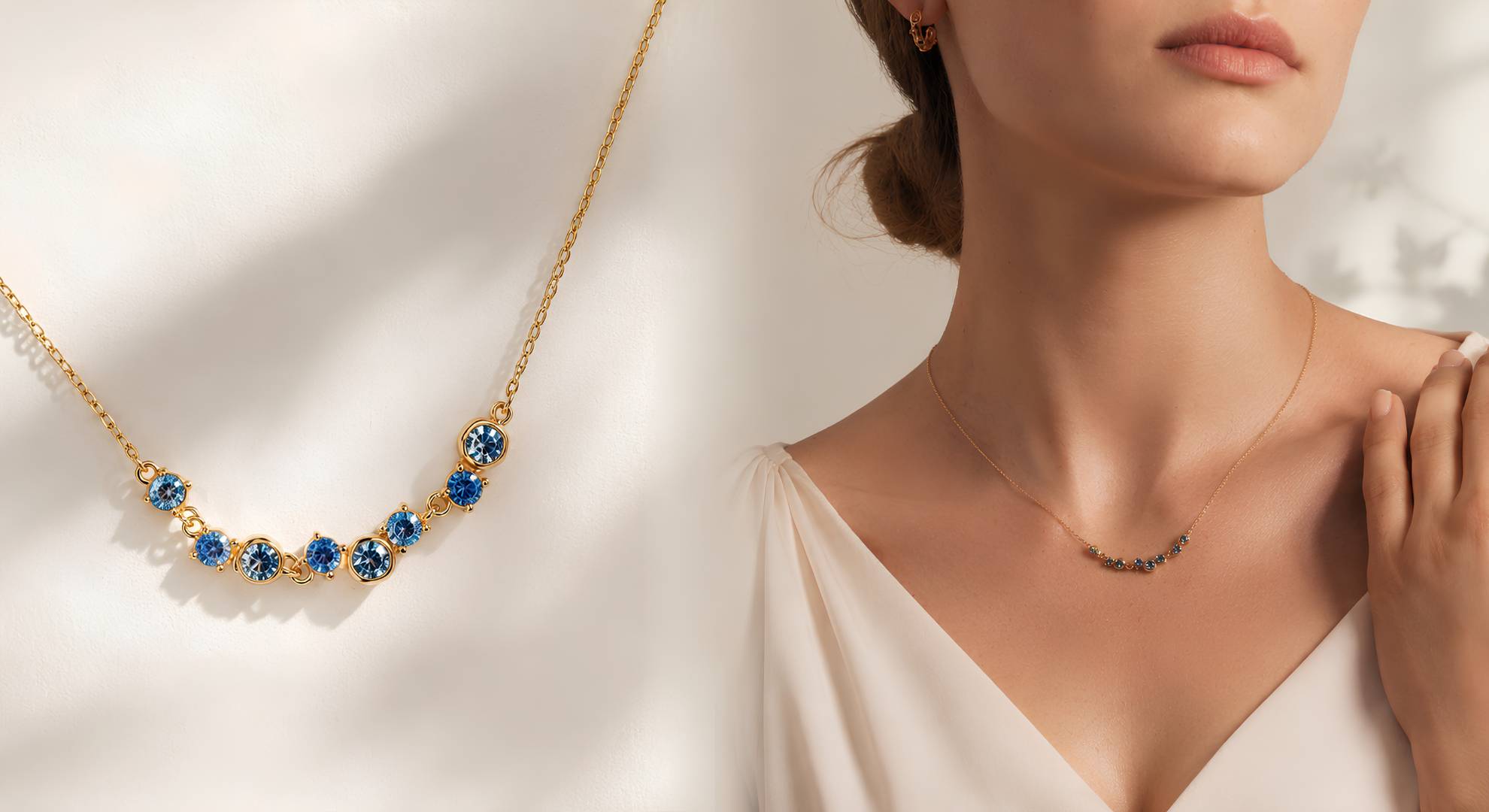 Gold necklace with blue stones on a white background