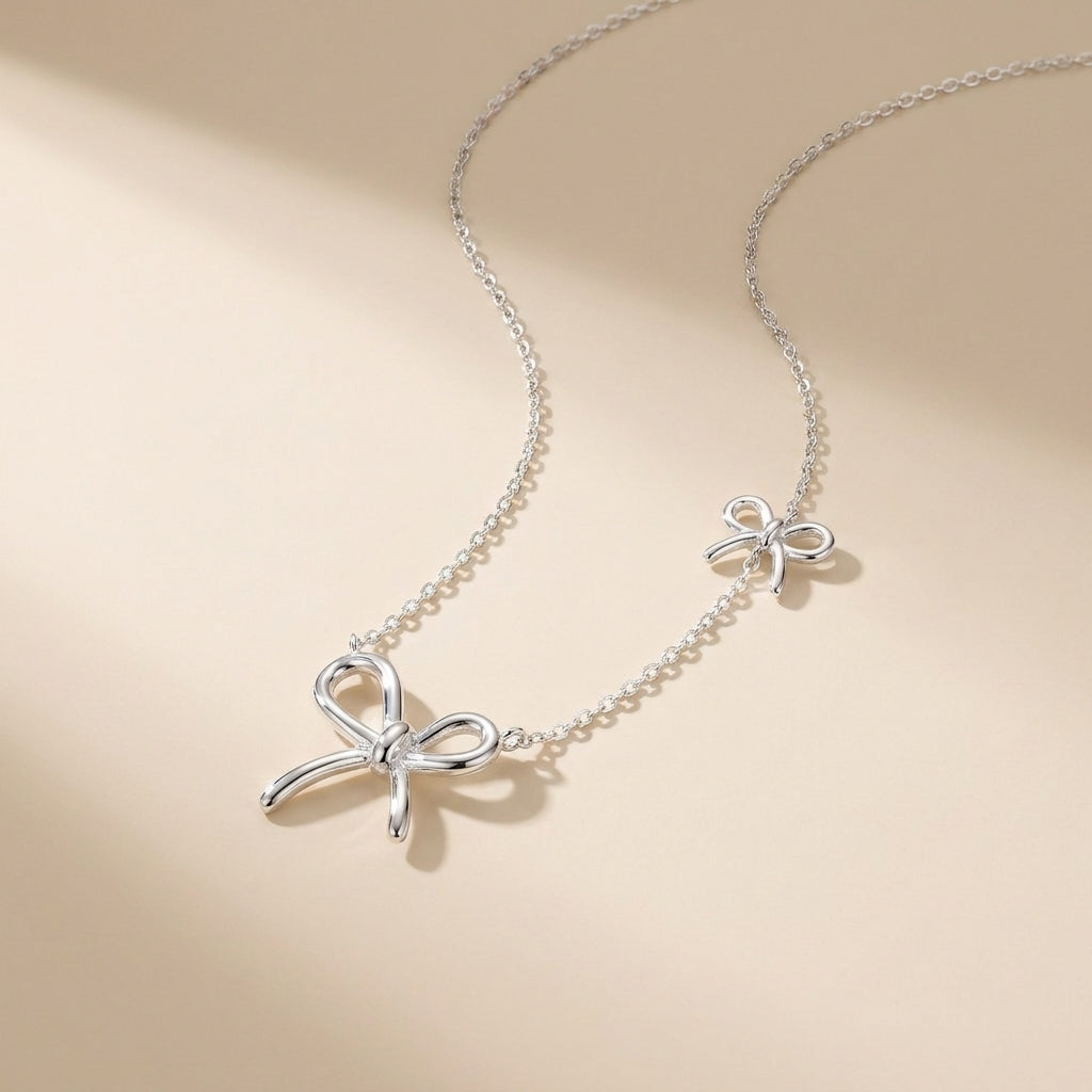 Buy Double Bow Charm Necklace - 925 Sterling Silver - Necklaces at Presentopia