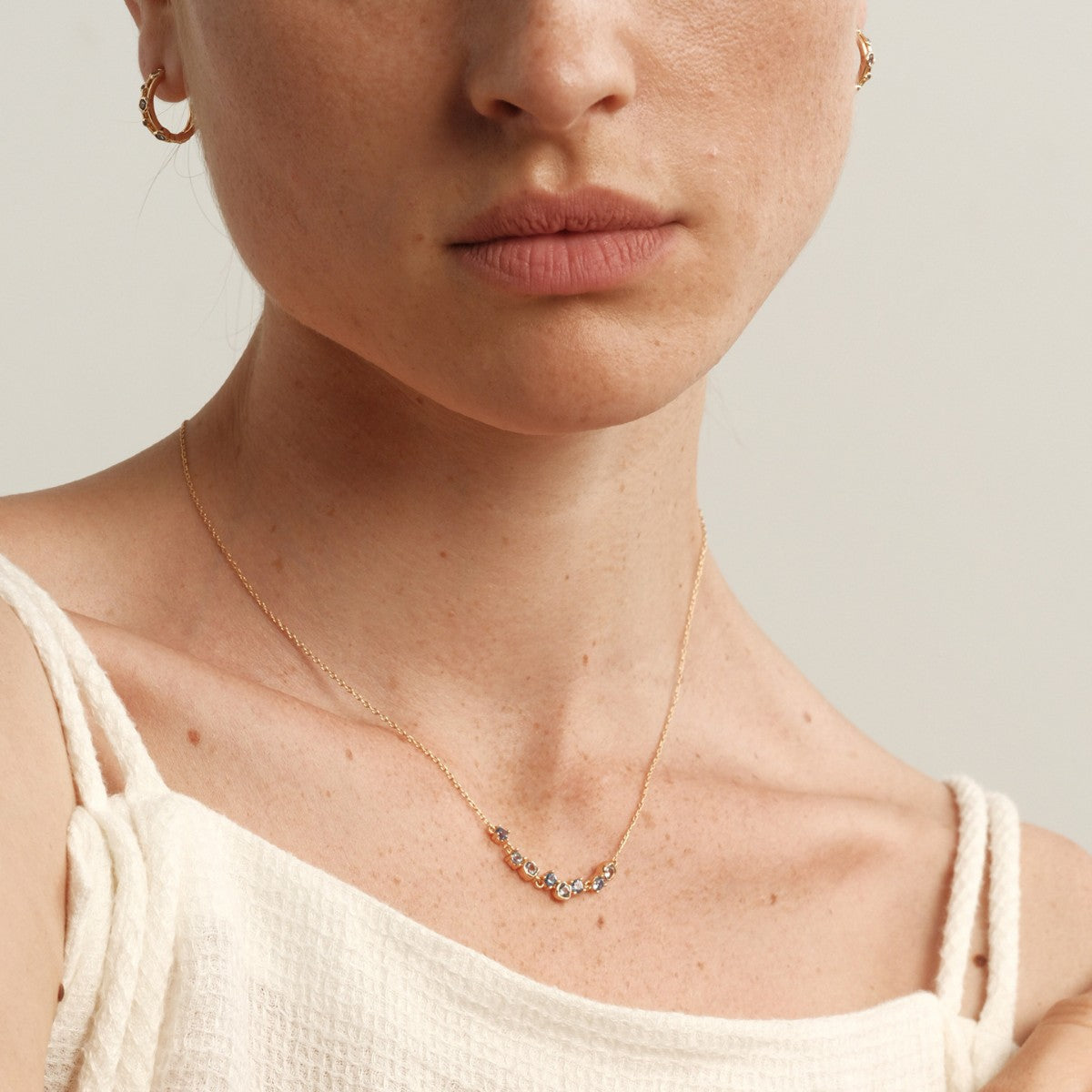 Scattered Blue Zircon Curved Necklace – Gold Plated 925 Sterling Silver - Photo 8 | Pinky Promise